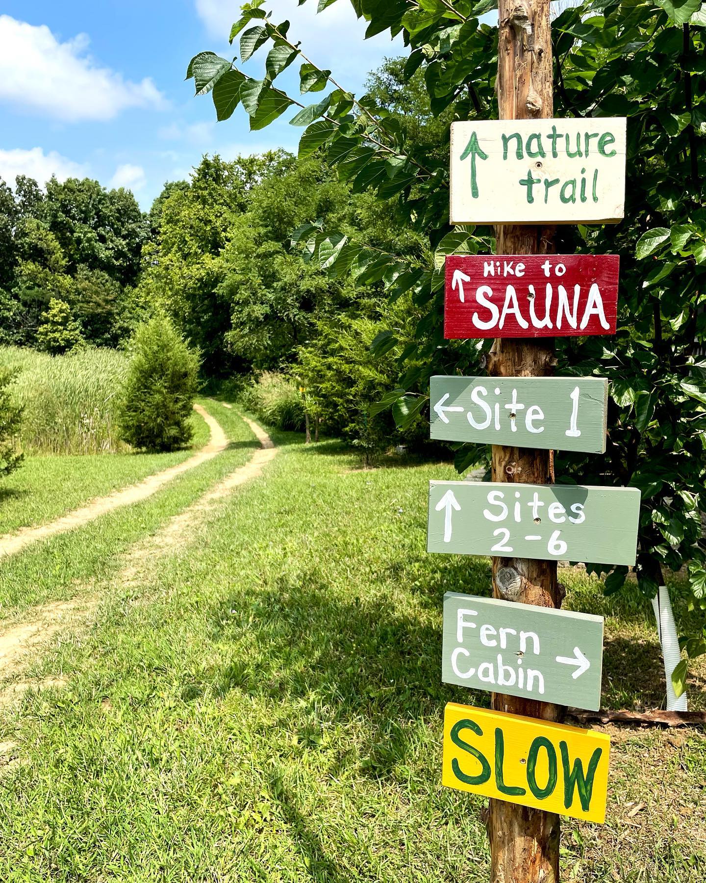 Trails are marked with wooden signs throughout the property