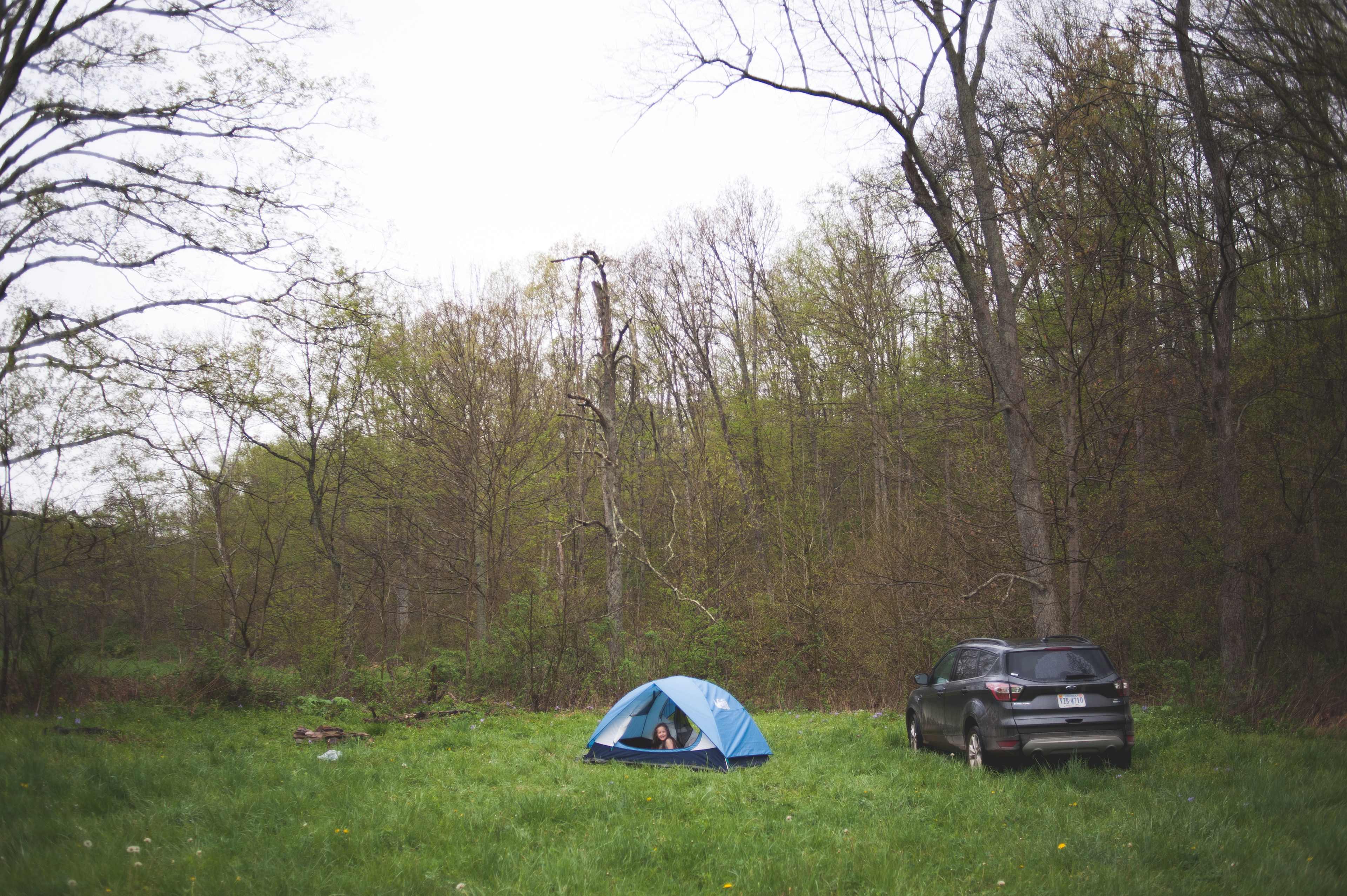 Girls ran into the tent once it started raining.