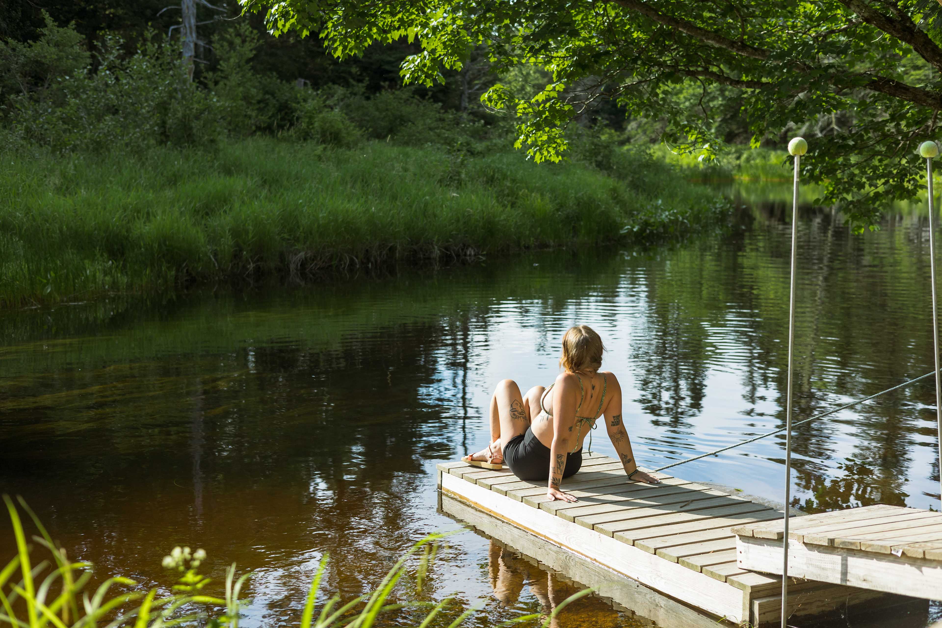 There is a dock for you to lounge on or launch off of. 
